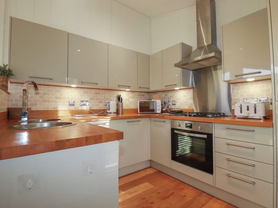 Fridge, electric kettle, toaster, cookware/dishes/utensils