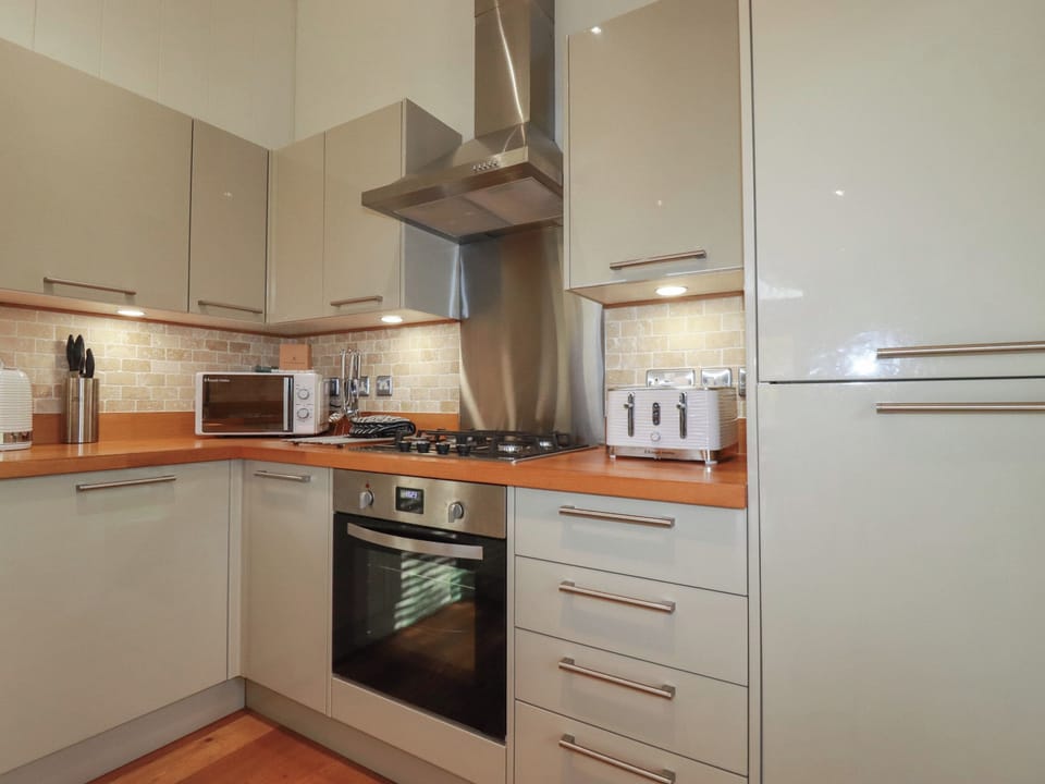 Fridge, electric kettle, toaster, cookware/dishes/utensils
