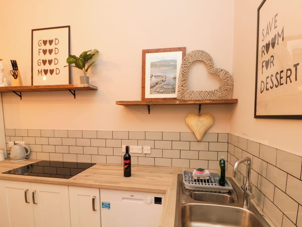 Fridge, dishwasher, electric kettle, cookware/dishes/utensils