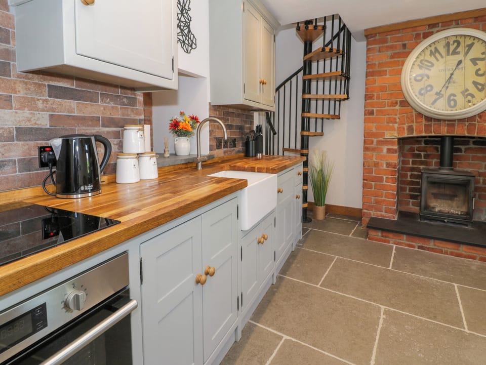 Fridge, electric kettle, toaster, cookware/dishes/utensils