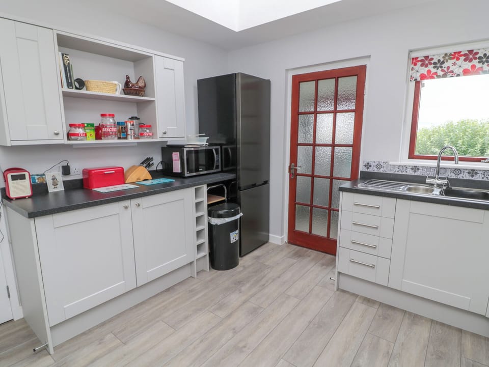 Fridge, electric kettle, toaster, cookware/dishes/utensils