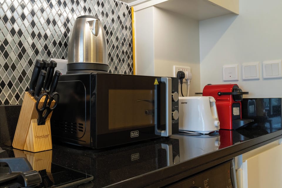 Superior Studio Suite, Ocean View | Private kitchen | Espresso maker, coffee/tea maker, electric kettle