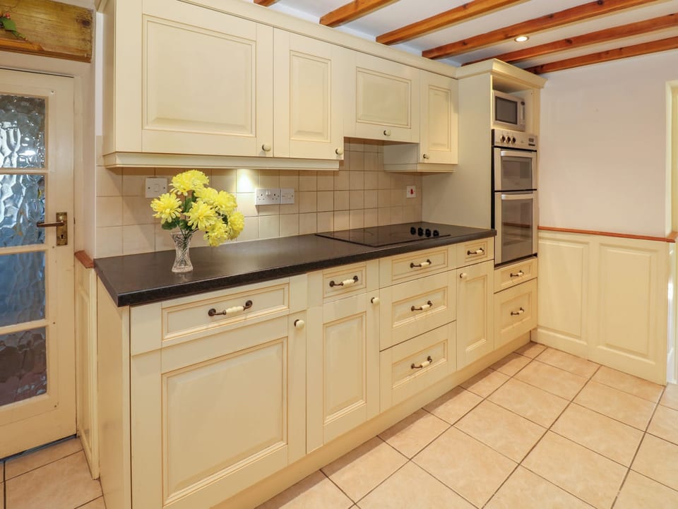 Fridge, dishwasher, toaster, cookware/dishes/utensils