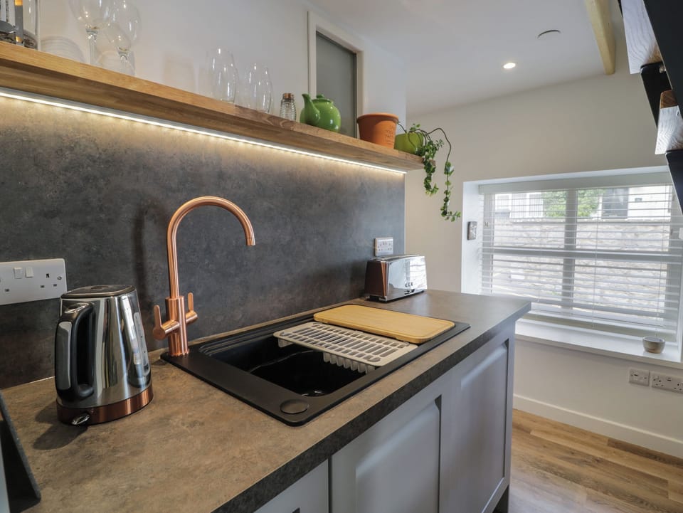 Fridge, electric kettle, toaster, cookware/dishes/utensils