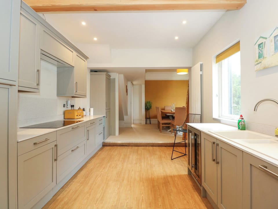 Fridge, dishwasher, cookware/dishes/utensils