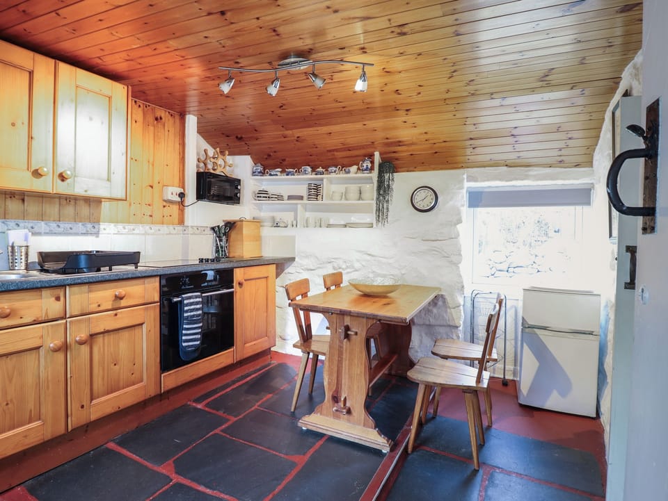 Fridge, electric kettle, toaster, cookware/dishes/utensils