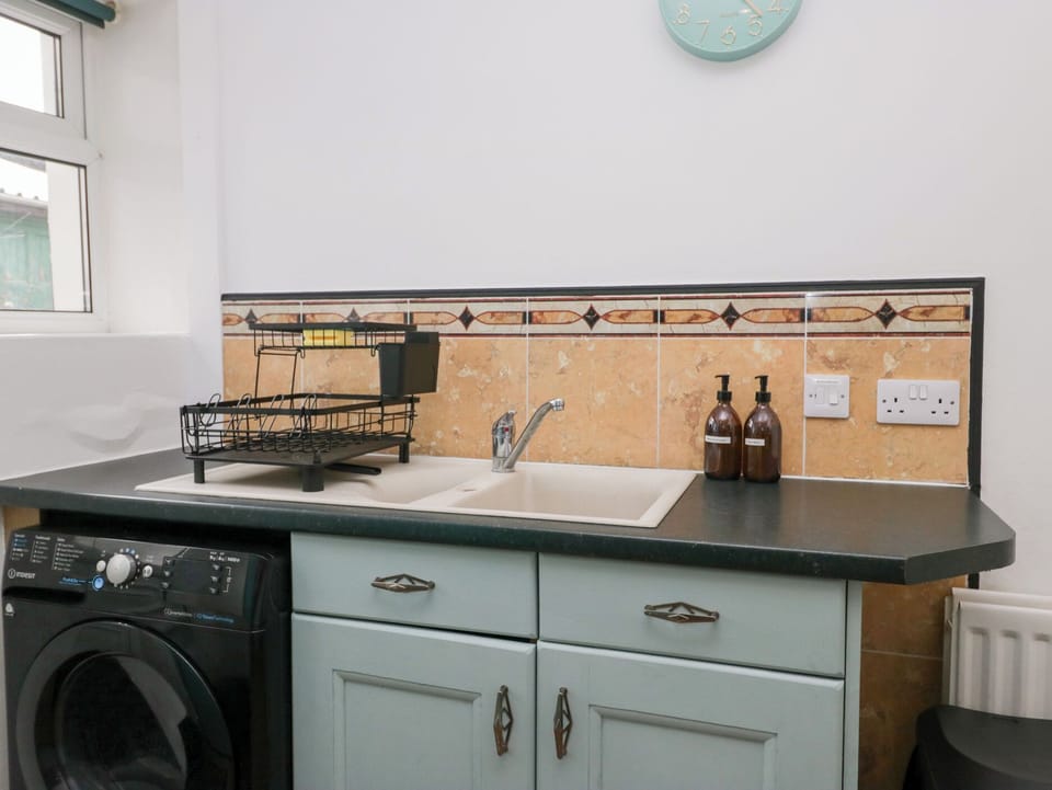 Fridge, electric kettle, toaster, cookware/dishes/utensils