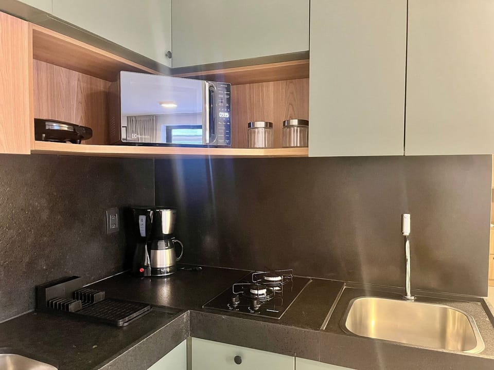 Apartment | Private kitchen | Fridge, microwave, stovetop, cookware/dishes/utensils