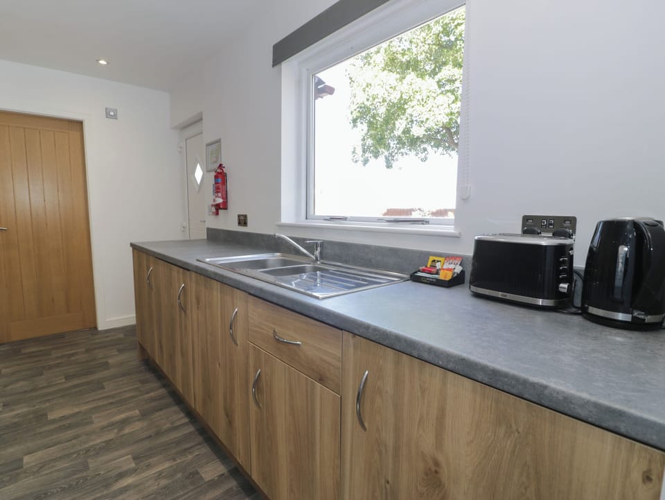 Fridge, electric kettle, toaster, cookware/dishes/utensils
