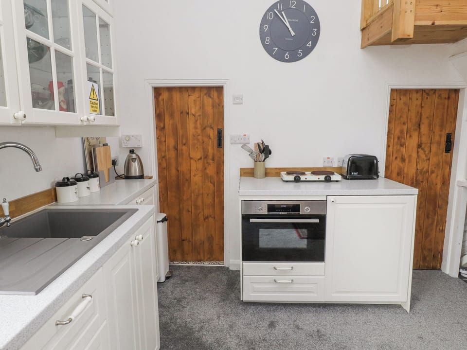 Fridge, electric kettle, toaster, cookware/dishes/utensils