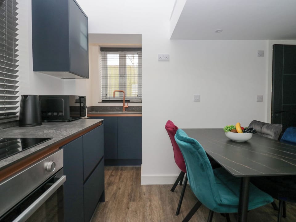 Fridge, electric kettle, toaster, cookware/dishes/utensils