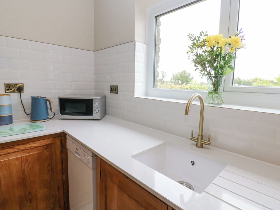 Fridge, dishwasher, electric kettle, cookware/dishes/utensils