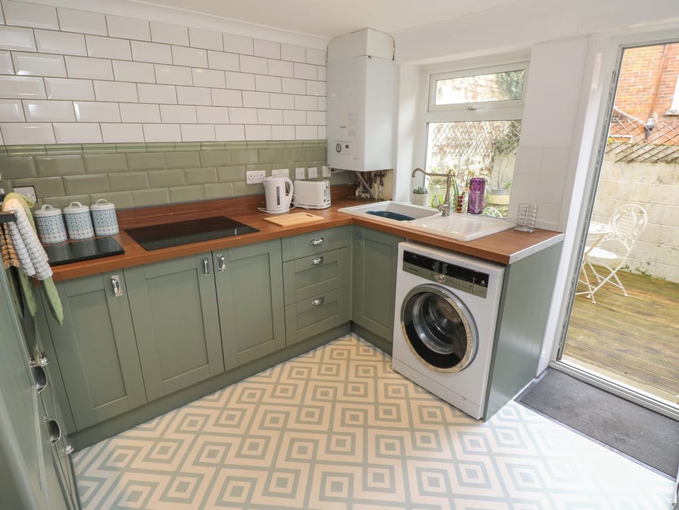 Fridge, electric kettle, toaster, cookware/dishes/utensils