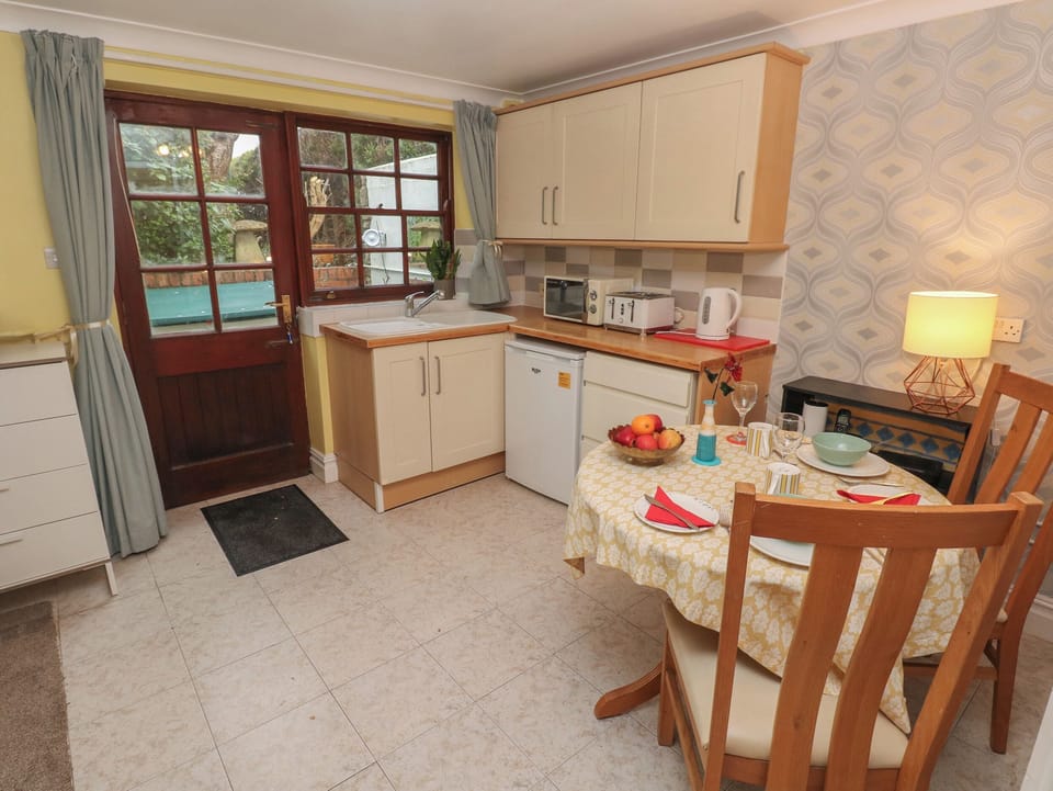 Fridge, electric kettle, toaster, cookware/dishes/utensils