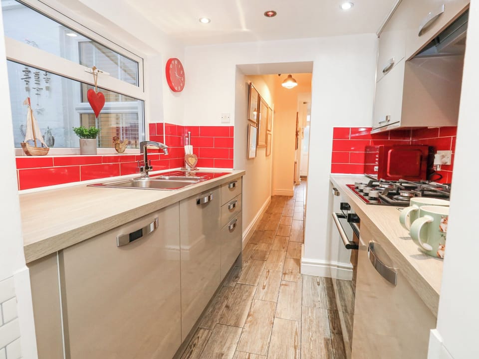 Fridge, electric kettle, cookware/dishes/utensils