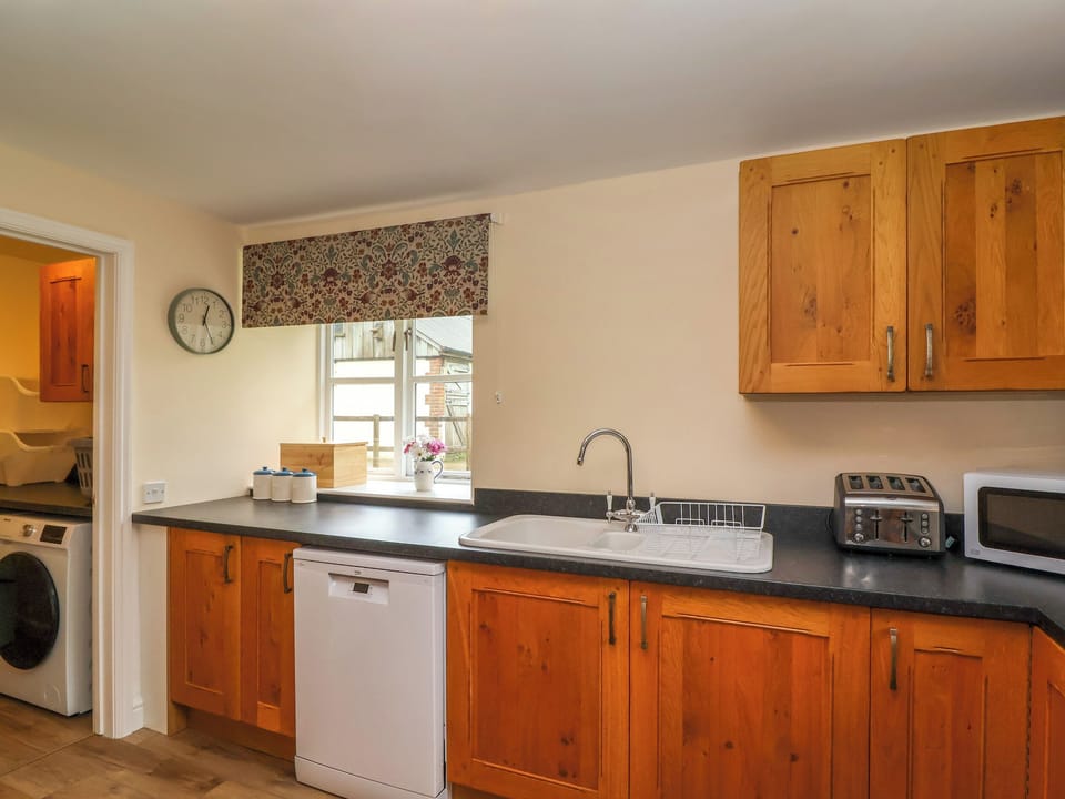 Fridge, dishwasher, electric kettle, cookware/dishes/utensils
