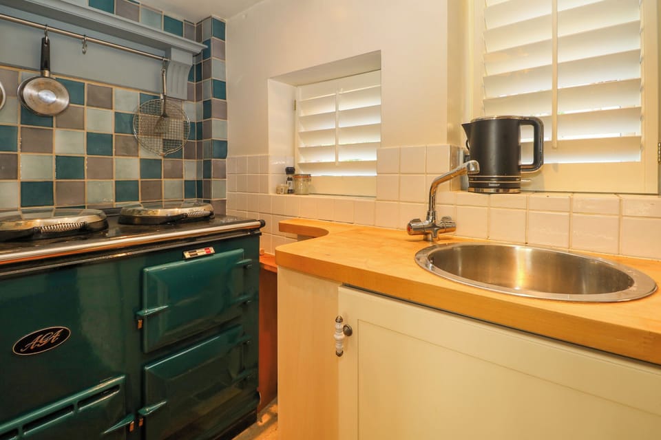 Fridge, electric kettle, toaster, cookware/dishes/utensils
