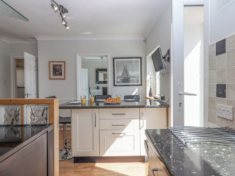 Fridge, dishwasher, toaster, cookware/dishes/utensils