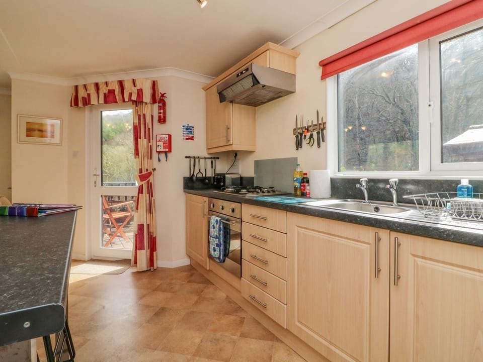 Fridge, electric kettle, cookware/dishes/utensils