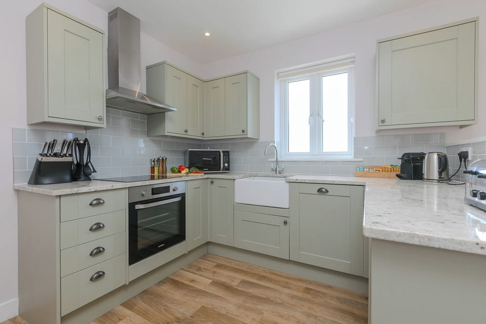 Fridge, electric kettle, toaster, cookware/dishes/utensils