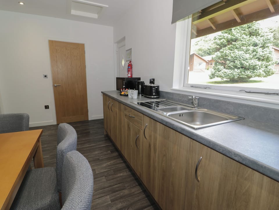 Fridge, electric kettle, toaster, cookware/dishes/utensils