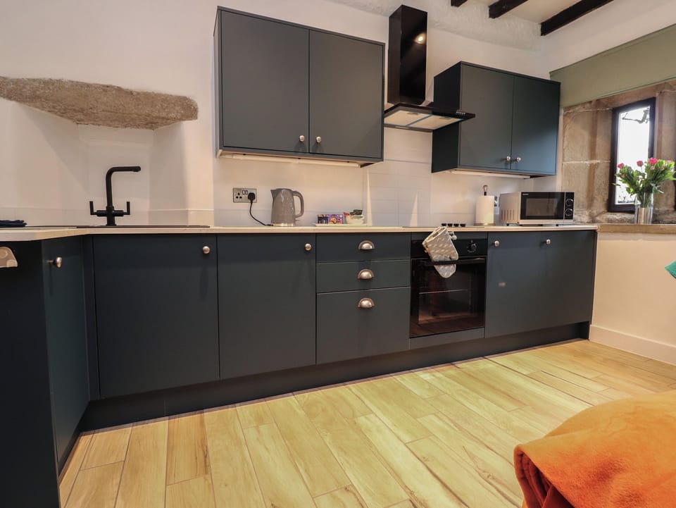 Fridge, electric kettle, toaster, cookware/dishes/utensils