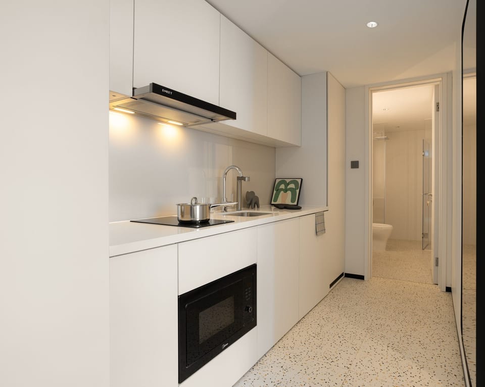 Standard Suite | Private kitchen | Mini-fridge, shared microwave