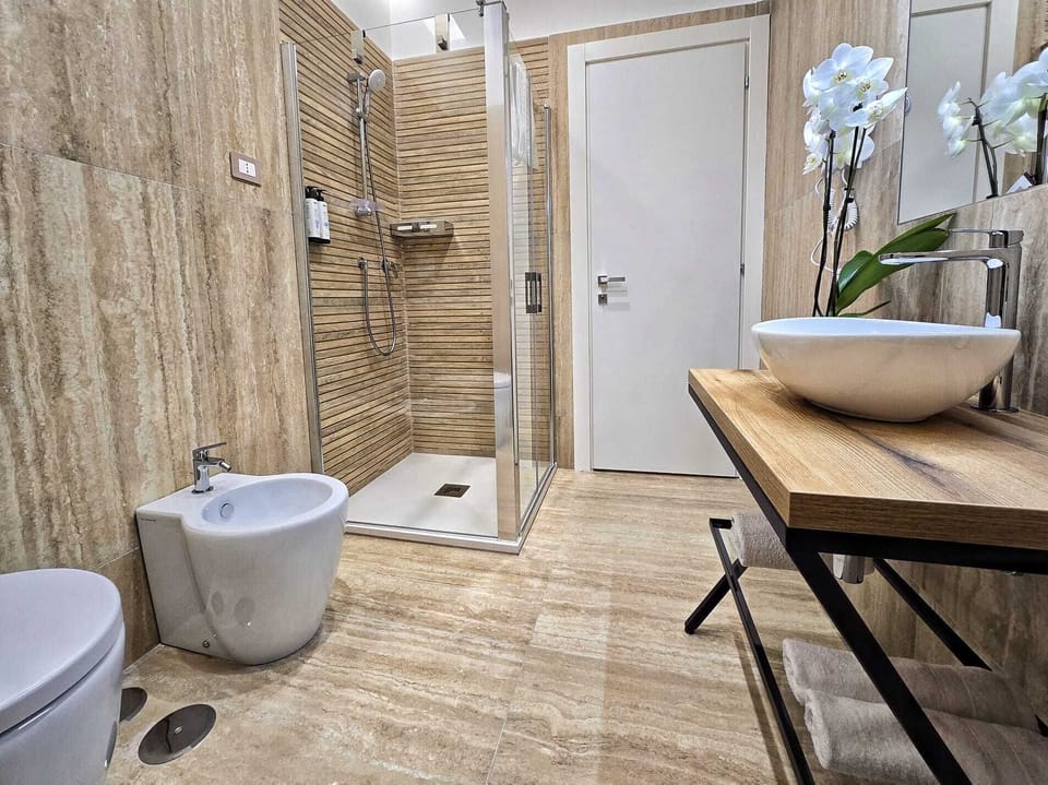 Comfort Double Room, Partial Sea View | Bathroom | Shower, rainfall showerhead, free toiletries, hair dryer
