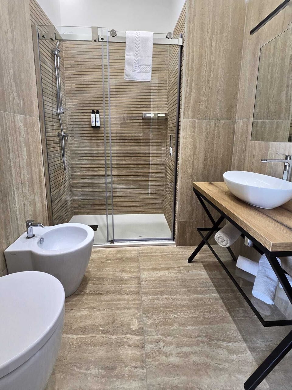 Exclusive Triple Room, Partial Sea View | Bathroom | Shower, rainfall showerhead, free toiletries, hair dryer