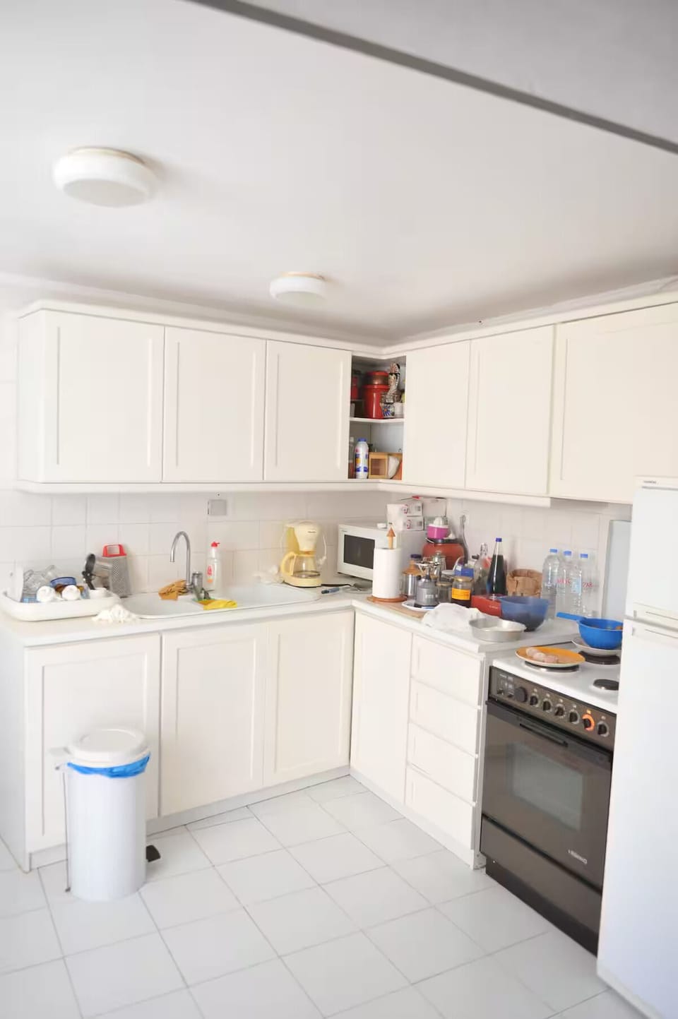 Comfort Apartment, City View | Private kitchen | Fridge, microwave, oven, stovetop