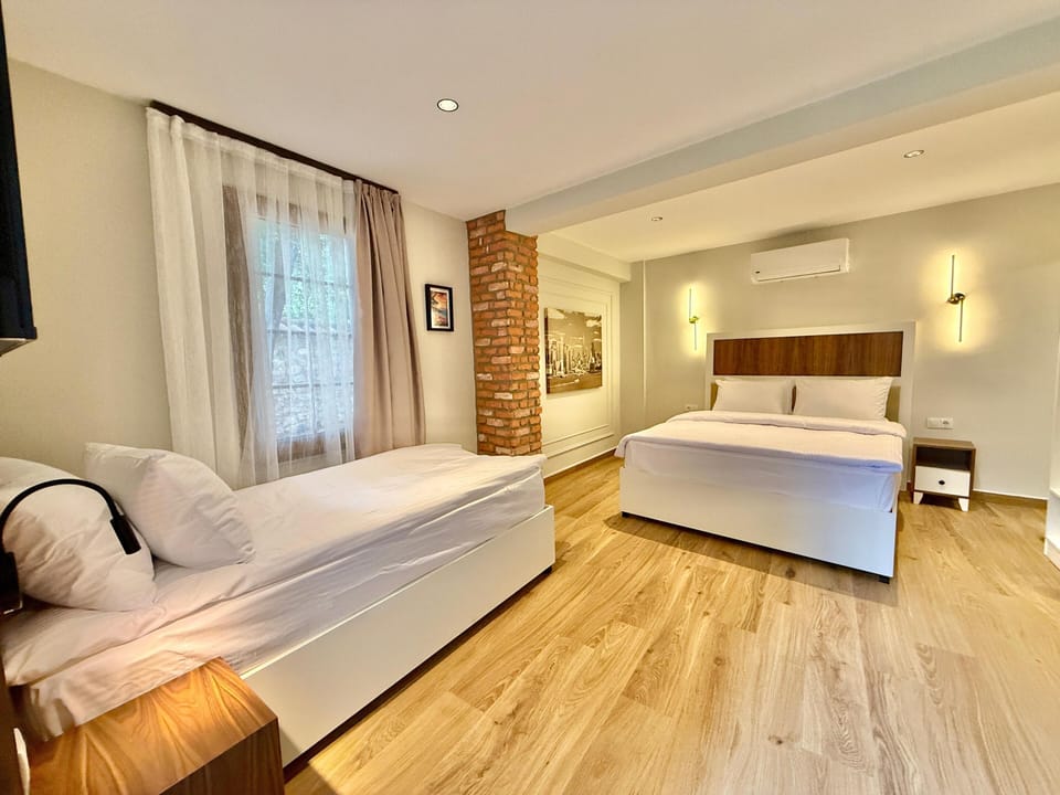 Triple Room, Balcony, Garden View | Premium bedding, minibar, soundproofing, cribs (free)
