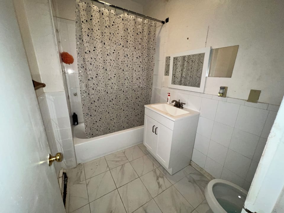 Combined shower/tub, soap, toilet paper