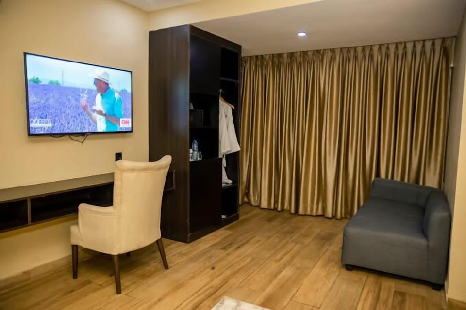 Family Room, Balcony, City View | Desk, laptop workspace, soundproofing, free WiFi