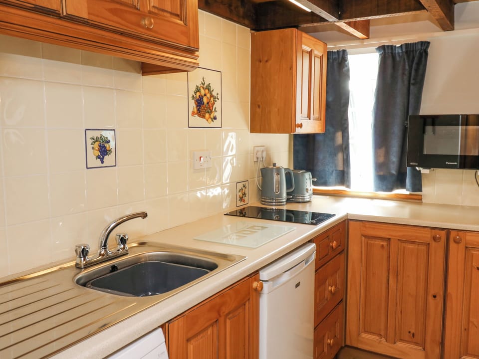 Fridge, electric kettle, toaster, cookware/dishes/utensils