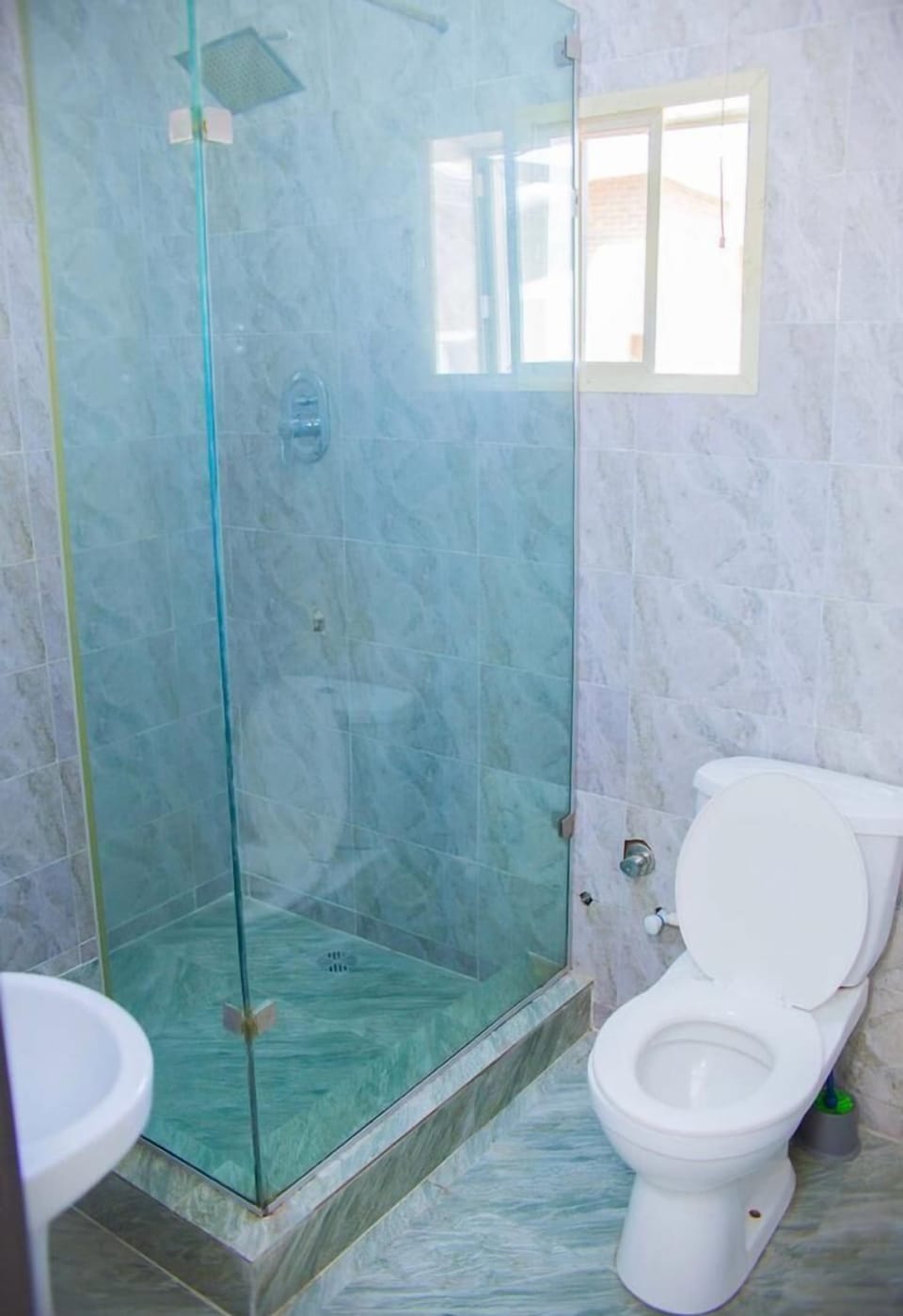 Deluxe Room | Bathroom | Shower, towels, soap, toilet paper