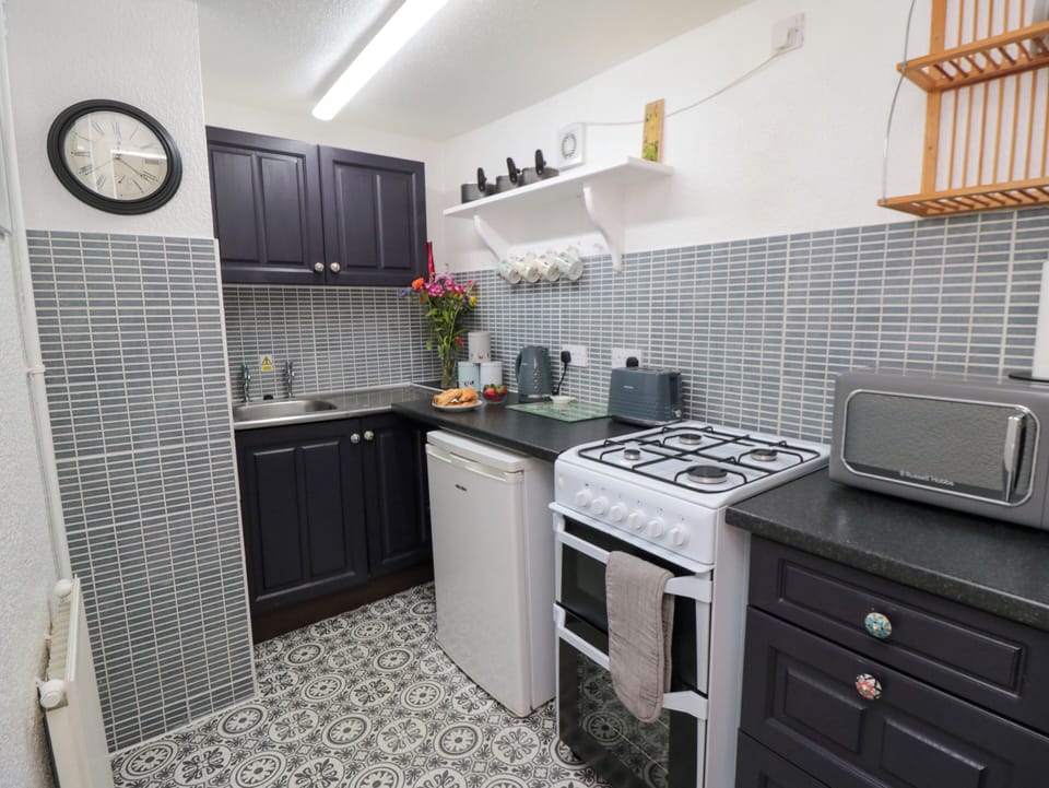 Fridge, microwave, cookware/dishes/utensils