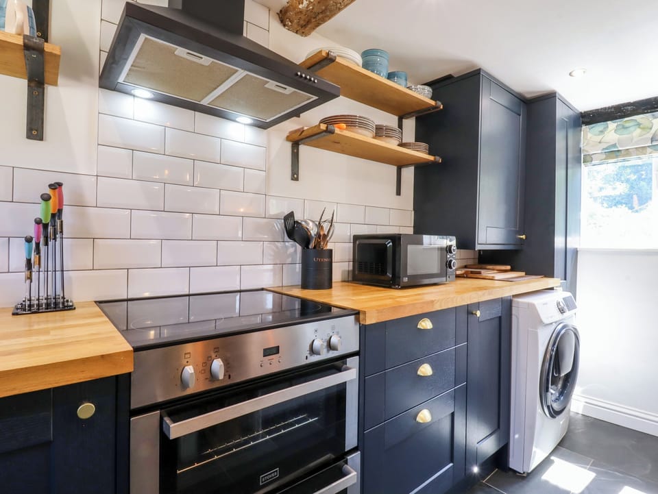 Microwave, toaster, cookware/dishes/utensils