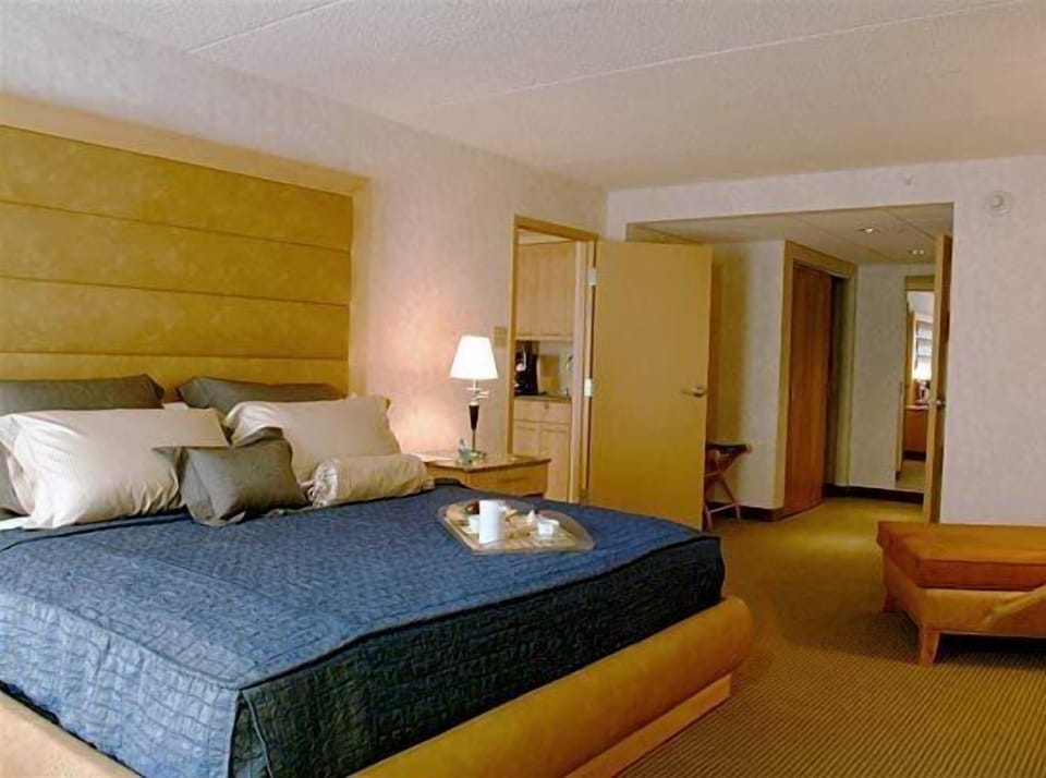 Suite, 1 King Bed and Queen Sofa Bed (Serenity Suite) | Premium bedding, pillowtop beds, in-room safe, blackout drapes