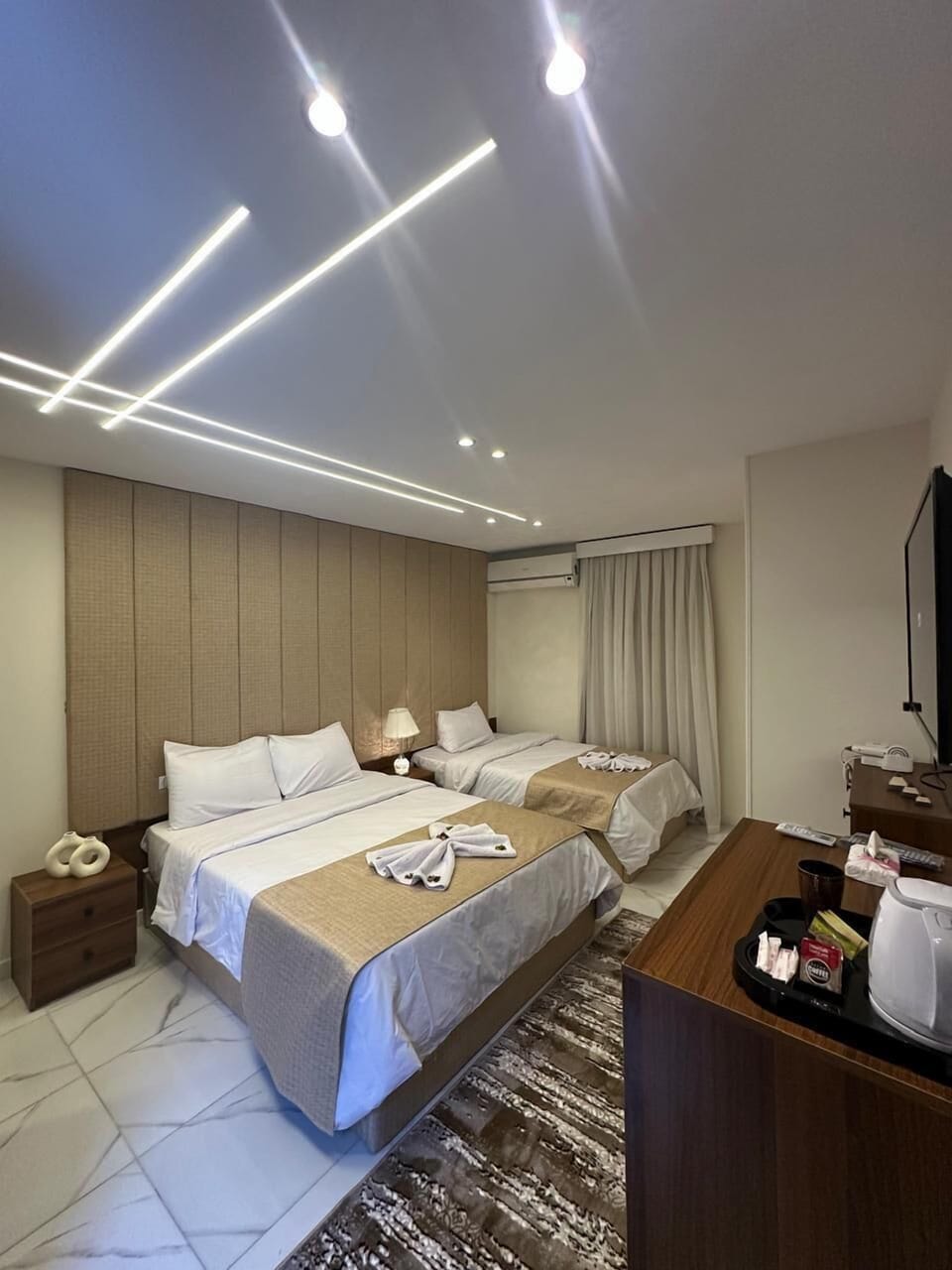 Family Suite | Free minibar items, in-room safe, laptop workspace, blackout drapes