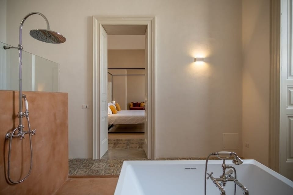 Superior Suite, Non Smoking, Bathtub | Bathroom | Free toiletries, hair dryer, bidet, towels