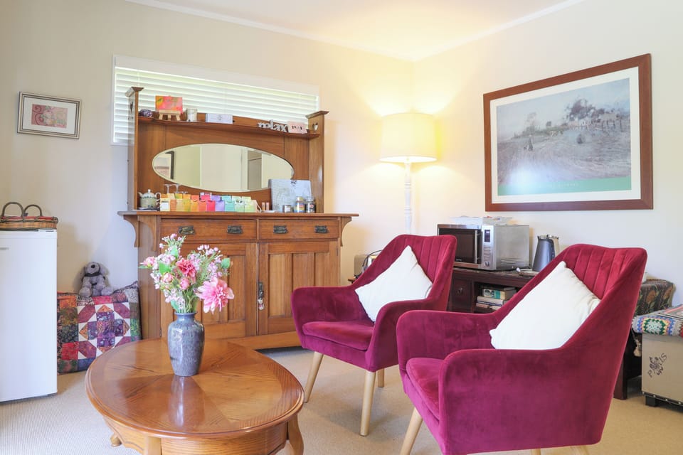 Suite, 1 Queen Bed, Microwave, Beach View | Living area | TV, printers