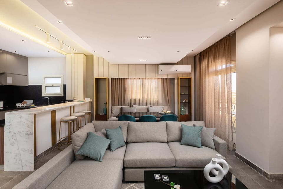 Basic Apartment | Living area | 55-inch Smart TV with satellite channels