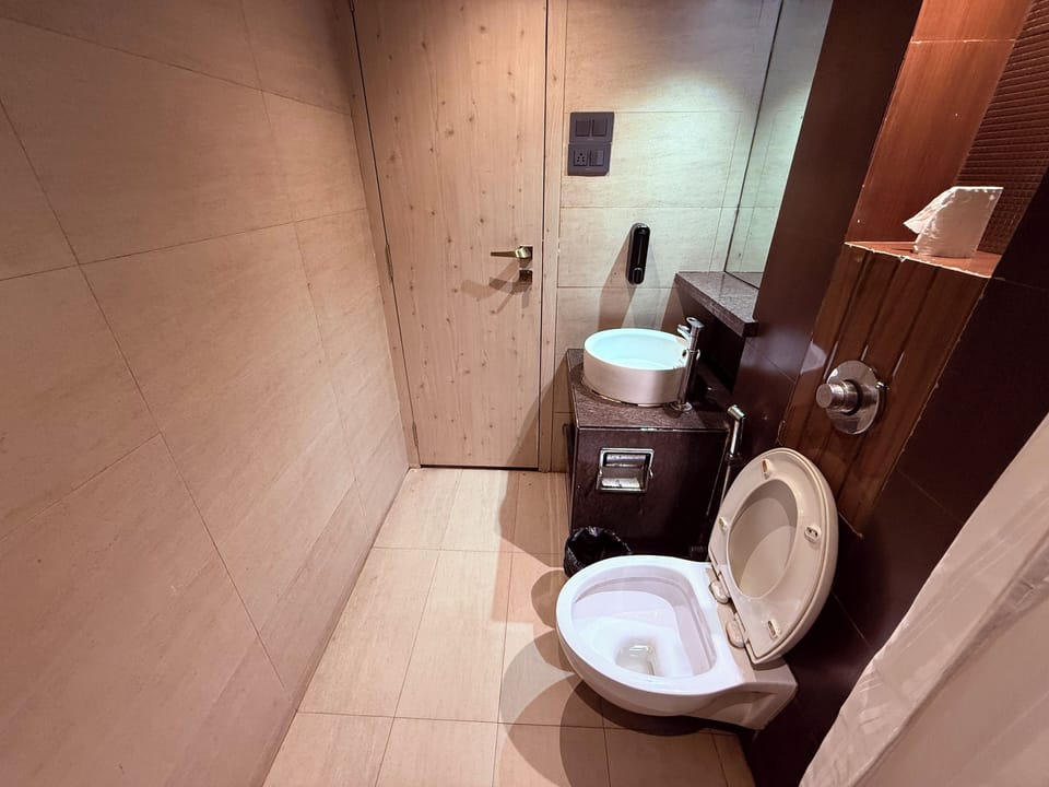 Shower, slippers, towels, soap