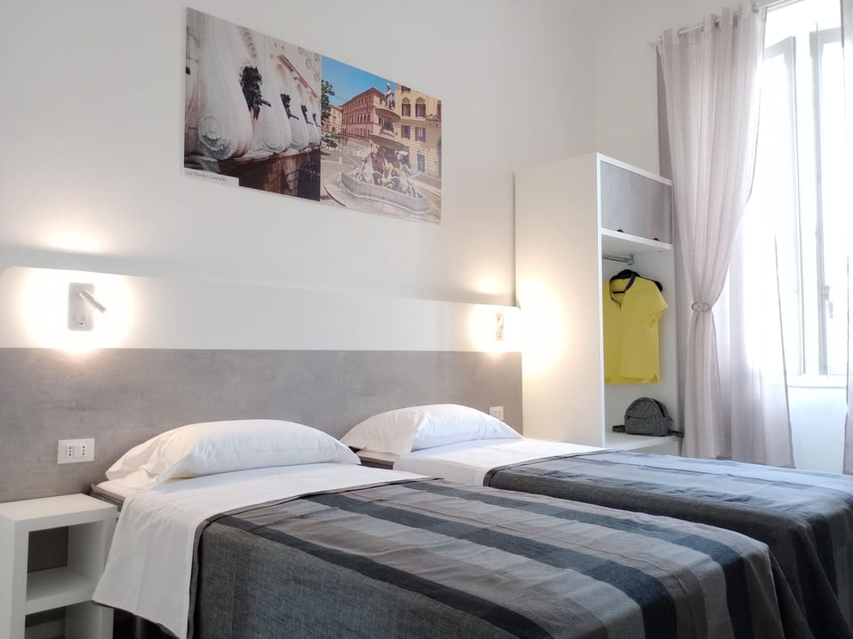Double or Twin Room, Private Bathroom, City View | Free minibar, desk, free WiFi, bed sheets