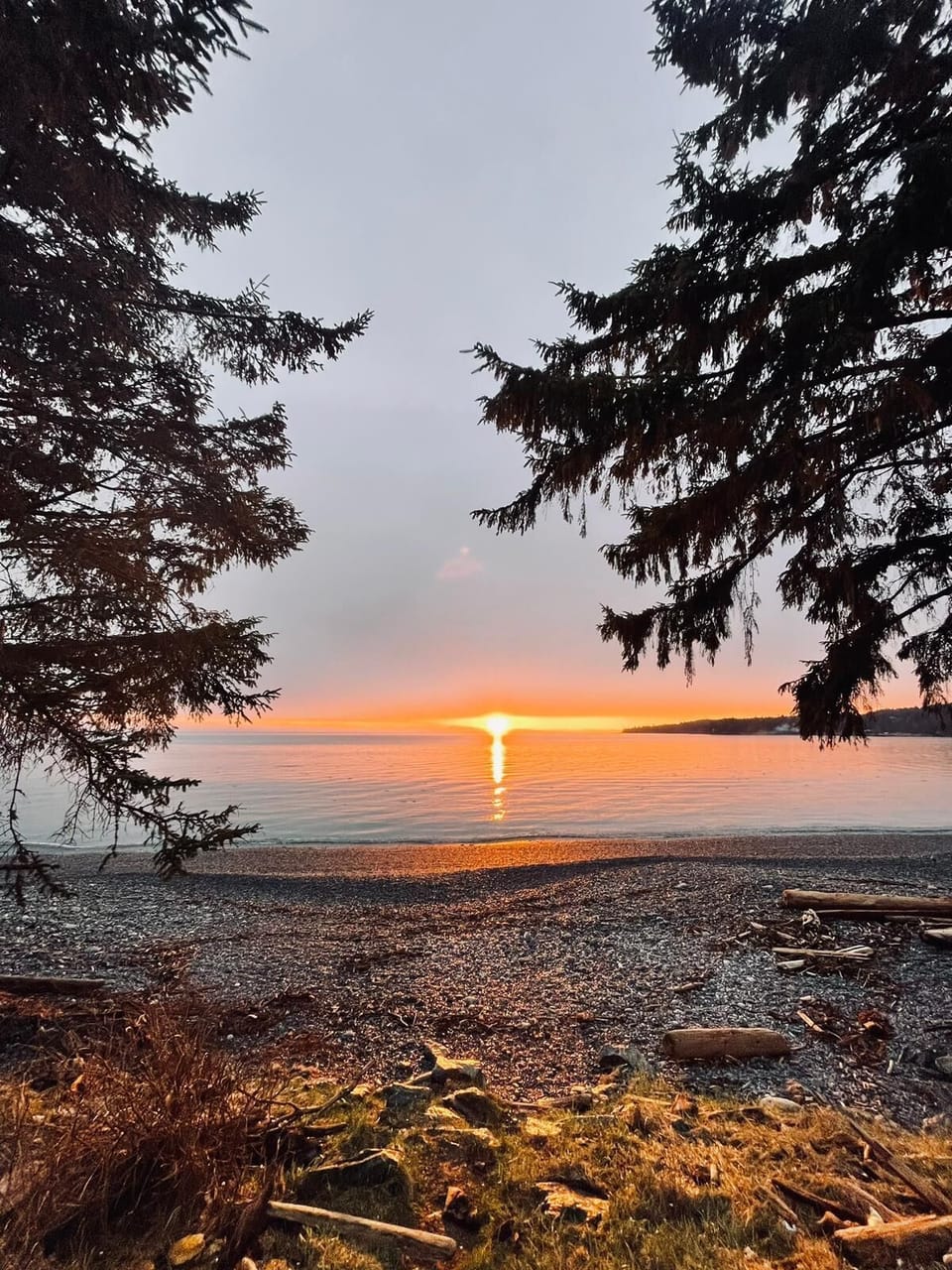 On the beach, black sand