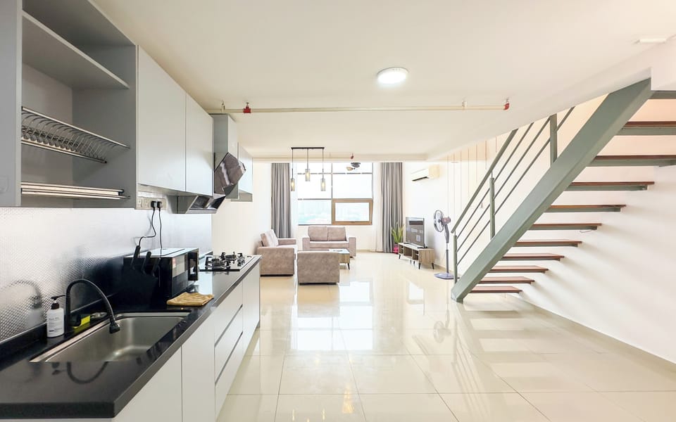 Basic Loft, City View | Living area | 45-inch Smart TV with digital channels