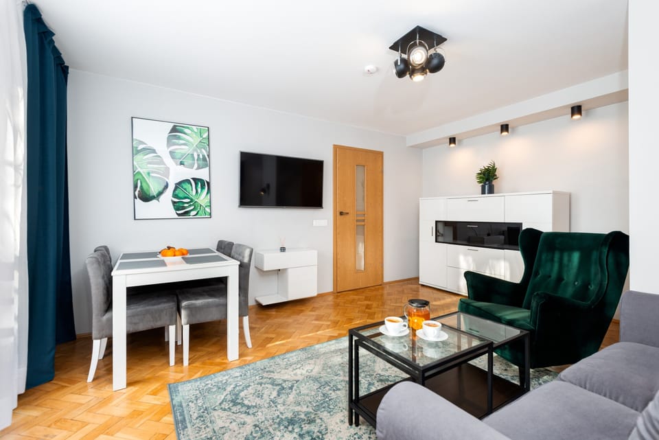 Comfort Apartment, Balcony, City View | Living area | 50-inch Smart TV with digital channels, Netflix, streaming services