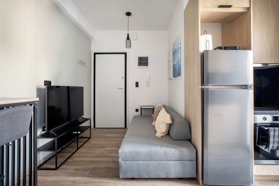 Deluxe Double Room, 1 Bedroom, Balcony, City View | Living area | 45-inch Smart TV with digital channels, streaming services
