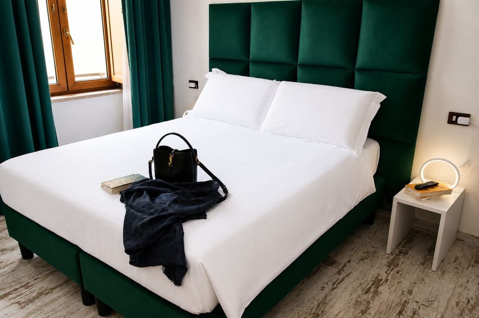 Deluxe Townhome, 1 King Bed, Non Smoking, Housekeeping | 1 bedroom, desk, laptop workspace, soundproofing