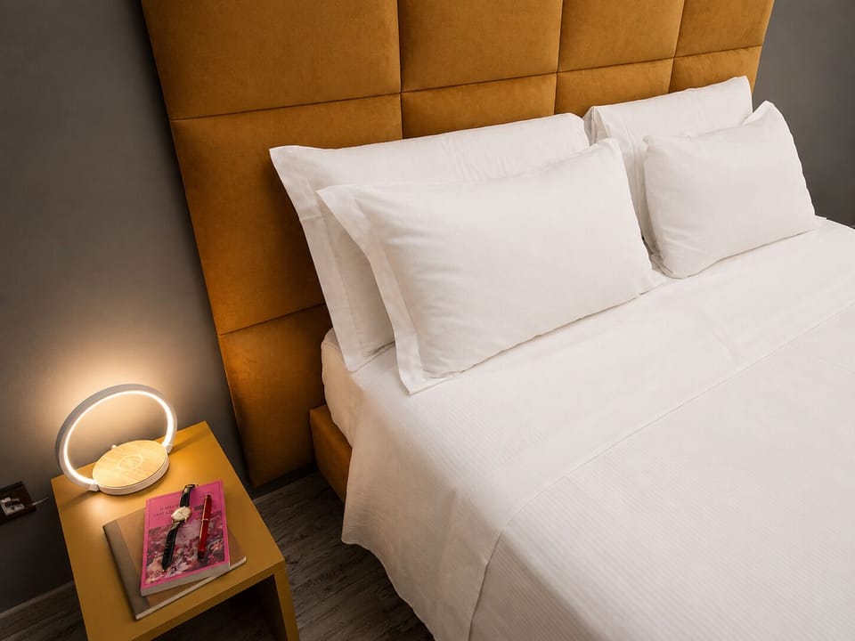 Deluxe Townhome, 1 King Bed, Non Smoking, Housekeeping | 1 bedroom, desk, laptop workspace, soundproofing
